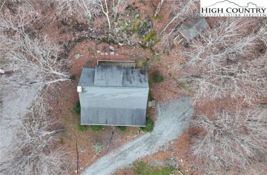 What everyone dreams of!  A log cabin on a mountain.  This one on Beech Mountain Club in North Carolina - for sale on GolfHomes.com, golf home, golf lot