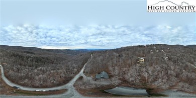 What everyone dreams of!  A log cabin on a mountain.  This one on Beech Mountain Club in North Carolina - for sale on GolfHomes.com, golf home, golf lot