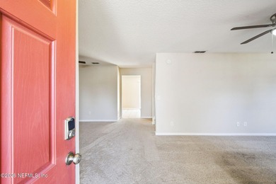 Welcome to this well maintained three bedroom, two bath townhome on Golf Club At Fleming Island in Florida - for sale on GolfHomes.com, golf home, golf lot