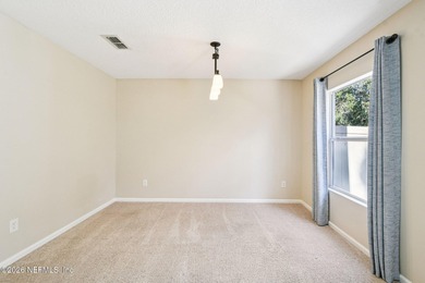 Welcome to this well maintained three bedroom, two bath townhome on Golf Club At Fleming Island in Florida - for sale on GolfHomes.com, golf home, golf lot