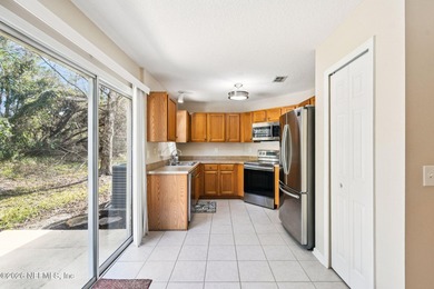 Welcome to this well maintained three bedroom, two bath townhome on Golf Club At Fleming Island in Florida - for sale on GolfHomes.com, golf home, golf lot