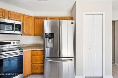 Welcome to this well maintained three bedroom, two bath townhome on Golf Club At Fleming Island in Florida - for sale on GolfHomes.com, golf home, golf lot