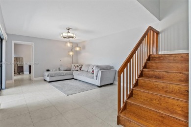 This appealing move-in ready townhome located in desirable on Pine Island Ridge Country Club in Florida - for sale on GolfHomes.com, golf home, golf lot