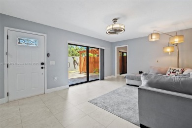 This appealing move-in ready townhome located in desirable on Pine Island Ridge Country Club in Florida - for sale on GolfHomes.com, golf home, golf lot