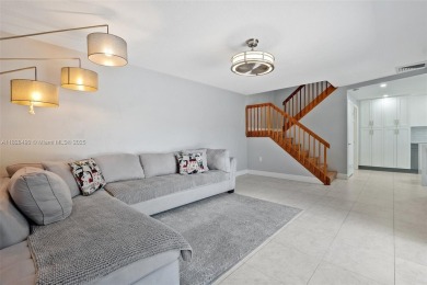 This appealing move-in ready townhome located in desirable on Pine Island Ridge Country Club in Florida - for sale on GolfHomes.com, golf home, golf lot