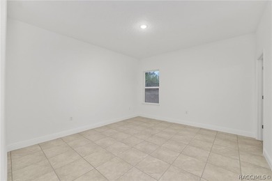 Discover effortless living in this brand-new 4-bedroom, 2-bath on Pine Ridge Community Golf and Country Club in Florida - for sale on GolfHomes.com, golf home, golf lot