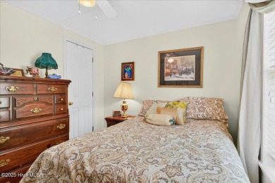 This sweet coastal cottage is move in ready. Sit on the screened on Sea Trail Golf Resort in North Carolina - for sale on GolfHomes.com, golf home, golf lot