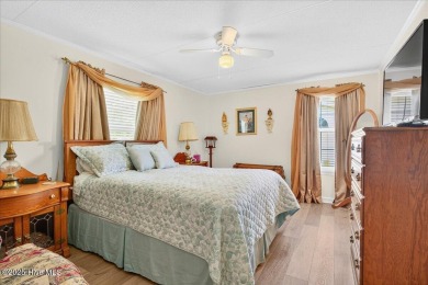 This sweet coastal cottage is move in ready. Sit on the screened on Sea Trail Golf Resort in North Carolina - for sale on GolfHomes.com, golf home, golf lot