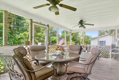This sweet coastal cottage is move in ready. Sit on the screened on Sea Trail Golf Resort in North Carolina - for sale on GolfHomes.com, golf home, golf lot