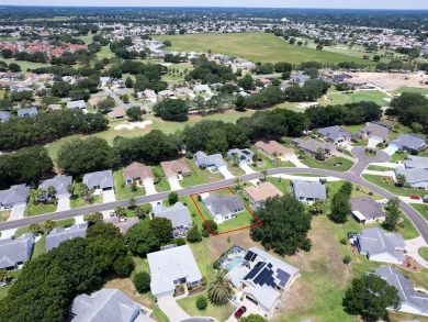 LOCATION! UPDATES! NO KISSING LANAIS! AND LOTS OF OUTDOOR SPACE! on Hacienda Hills Golf and Country Club in Florida - for sale on GolfHomes.com, golf home, golf lot