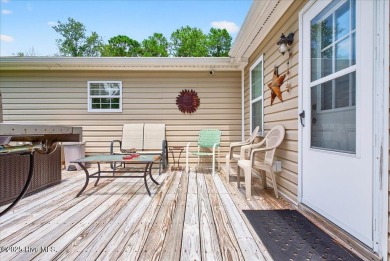 This sweet coastal cottage is move in ready. Sit on the screened on Sea Trail Golf Resort in North Carolina - for sale on GolfHomes.com, golf home, golf lot
