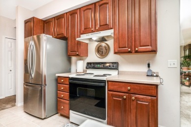 Welcome to this inviting, corner unit condominium, thoughtfully on Fellows Creek Golf Club in Michigan - for sale on GolfHomes.com, golf home, golf lot