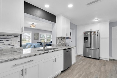 This stunning 2 bedroom, 2 bath, 1 car garage, 1649 sq. ft. home on Mainlands Golf Club in Florida - for sale on GolfHomes.com, golf home, golf lot