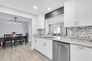 This stunning 2 bedroom, 2 bath, 1 car garage, 1649 sq. ft. home on Mainlands Golf Club in Florida - for sale on GolfHomes.com, golf home, golf lot