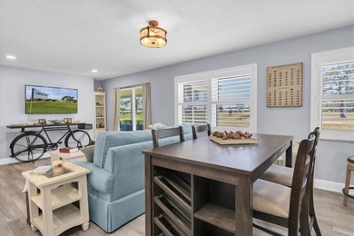 This stunning 2 bedroom, 2 bath, 1 car garage, 1649 sq. ft. home on Mainlands Golf Club in Florida - for sale on GolfHomes.com, golf home, golf lot