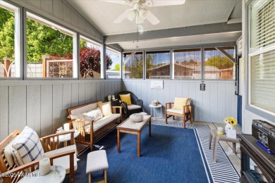 This charming and exceptionally well-maintained modular home is on Quail Wood Greens Golf Course in Arizona - for sale on GolfHomes.com, golf home, golf lot