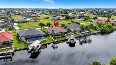 Welcome HOME to this Gulf access pool home that lives large in on Burnt Store Golf Club in Florida - for sale on GolfHomes.com, golf home, golf lot