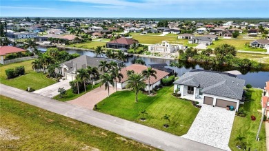 Welcome HOME to this Gulf access pool home that lives large in on Burnt Store Golf Club in Florida - for sale on GolfHomes.com, golf home, golf lot
