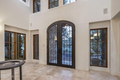Set on an expansive acre-plus lot within Hidden Paradise--a on Camelback Golf Club in Arizona - for sale on GolfHomes.com, golf home, golf lot