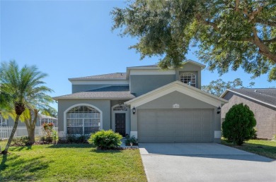 Nestled within the sought-after guard-gated Eagles Golf on The Eagles Golf Course and Club in Florida - for sale on GolfHomes.com, golf home, golf lot