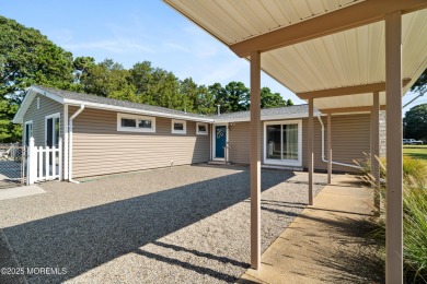 This charming 3-bedroom, 2-bathroom home is perfectly situated on Ocean County Golf Course At Atlantis in New Jersey - for sale on GolfHomes.com, golf home, golf lot