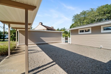 This charming 3-bedroom, 2-bathroom home is perfectly situated on Ocean County Golf Course At Atlantis in New Jersey - for sale on GolfHomes.com, golf home, golf lot