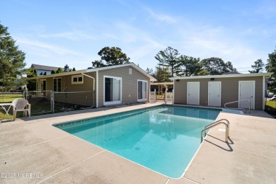 This charming 3-bedroom, 2-bathroom home is perfectly situated on Ocean County Golf Course At Atlantis in New Jersey - for sale on GolfHomes.com, golf home, golf lot
