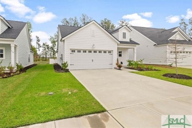 This gorgeous home is located in the luxury gated community of on Savannah Quarters Country Club in Georgia - for sale on GolfHomes.com, golf home, golf lot