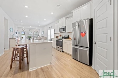 This gorgeous home is located in the luxury gated community of on Savannah Quarters Country Club in Georgia - for sale on GolfHomes.com, golf home, golf lot
