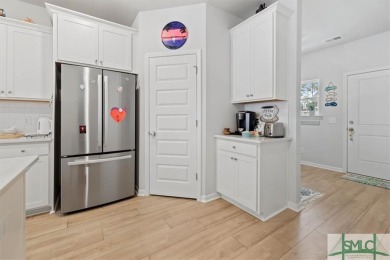 This gorgeous home is located in the luxury gated community of on Savannah Quarters Country Club in Georgia - for sale on GolfHomes.com, golf home, golf lot