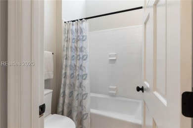 Discover your dream lock-and-leave townhome in Haig Point on on Haig Point Golf Club in South Carolina - for sale on GolfHomes.com, golf home, golf lot