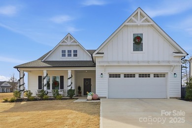Better than new, this gorgeous home has a welcoming rocking on Stonebridge Golf Club in North Carolina - for sale on GolfHomes.com, golf home, golf lot