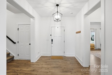 Better than new, this gorgeous home has a welcoming rocking on Stonebridge Golf Club in North Carolina - for sale on GolfHomes.com, golf home, golf lot