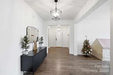 Better than new, this gorgeous home has a welcoming rocking on Stonebridge Golf Club in North Carolina - for sale on GolfHomes.com, golf home, golf lot