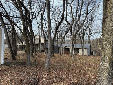 Beautiful multi-level home on a corner lot with fantastic on Holiday Island Golf Course in Arkansas - for sale on GolfHomes.com, golf home, golf lot