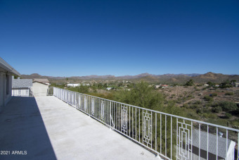 This home sits on a 1/2 acre with fabulous mountain views.  This on Queen Valley Golf Course in Arizona - for sale on GolfHomes.com, golf home, golf lot