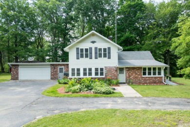 Situated on nearly 2.5 acres, this beautifully renovated farm on Meceola Country Club in Michigan - for sale on GolfHomes.com, golf home, golf lot