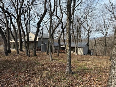 Beautiful multi-level home on a corner lot with fantastic on Holiday Island Golf Course in Arkansas - for sale on GolfHomes.com, golf home, golf lot