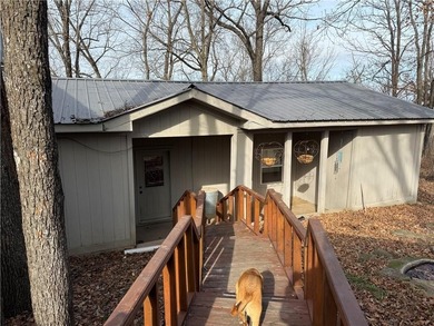 Beautiful multi-level home on a corner lot with fantastic on Holiday Island Golf Course in Arkansas - for sale on GolfHomes.com, golf home, golf lot