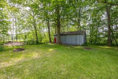 Situated on nearly 2.5 acres, this beautifully renovated farm on Meceola Country Club in Michigan - for sale on GolfHomes.com, golf home, golf lot