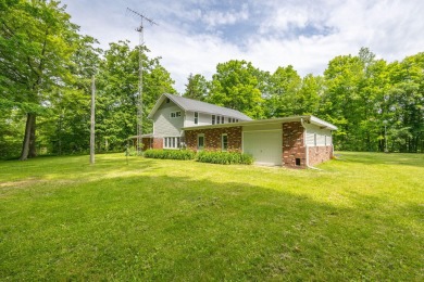 Situated on nearly 2.5 acres, this beautifully renovated farm on Meceola Country Club in Michigan - for sale on GolfHomes.com, golf home, golf lot