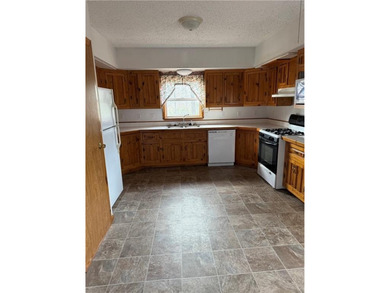 Beautiful multi-level home on a corner lot with fantastic on Holiday Island Golf Course in Arkansas - for sale on GolfHomes.com, golf home, golf lot