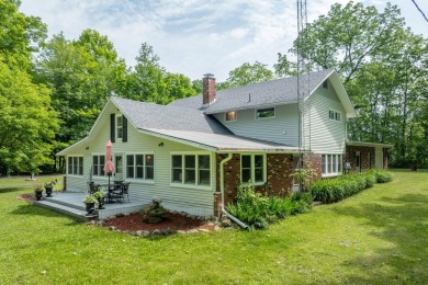 Situated on nearly 2.5 acres, this beautifully renovated farm on Meceola Country Club in Michigan - for sale on GolfHomes.com, golf home, golf lot