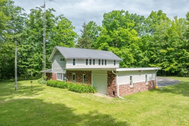 Situated on nearly 2.5 acres, this beautifully renovated farm on Meceola Country Club in Michigan - for sale on GolfHomes.com, golf home, golf lot