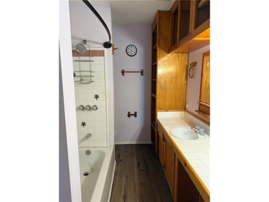 Beautiful multi-level home on a corner lot with fantastic on Holiday Island Golf Course in Arkansas - for sale on GolfHomes.com, golf home, golf lot