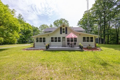 Situated on nearly 2.5 acres, this beautifully renovated farm on Meceola Country Club in Michigan - for sale on GolfHomes.com, golf home, golf lot