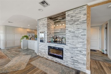 EXPERIENCE ELEVATED LIVING IN THIS HIGHLY FAVORED *H* UNIT AT on Las Vegas Country Club in Nevada - for sale on GolfHomes.com, golf home, golf lot