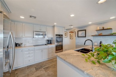 EXPERIENCE ELEVATED LIVING IN THIS HIGHLY FAVORED *H* UNIT AT on Las Vegas Country Club in Nevada - for sale on GolfHomes.com, golf home, golf lot