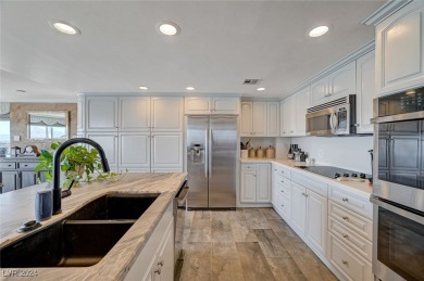 EXPERIENCE ELEVATED LIVING IN THIS HIGHLY FAVORED *H* UNIT AT on Las Vegas Country Club in Nevada - for sale on GolfHomes.com, golf home, golf lot