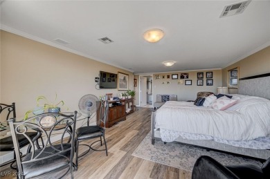 EXPERIENCE ELEVATED LIVING IN THIS HIGHLY FAVORED *H* UNIT AT on Las Vegas Country Club in Nevada - for sale on GolfHomes.com, golf home, golf lot